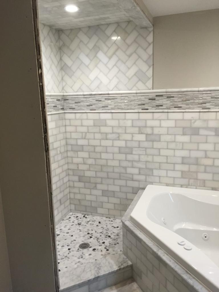 Full bathroom renovation and remodeling with modern fixtures by Riverstone Development general contractor in Bridgeport CT